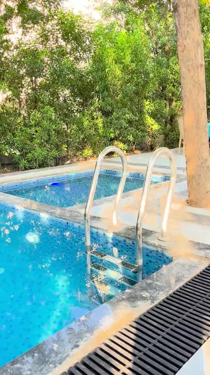 Steps into the swimming pool at Sai Samrat